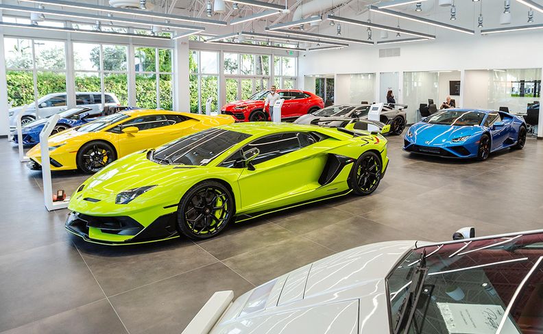 How Window Cleaning Companies Operate At Car Dealerships 1 A Lamborghini car dealership will often have lots of clean windows